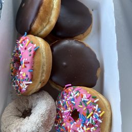 3 Bostons, 2 strawberry frosted, 1 cinnamon sugar 3 Bostons, 2 strawberry frosted, 1 cinnamon sugar