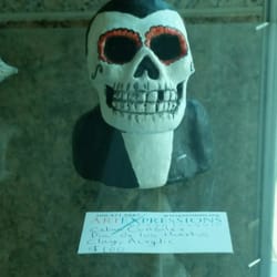 County of San Joaquin - I couldn't believe it, the art for sale was a clay figure of my brother. One of many works on display and on sale.