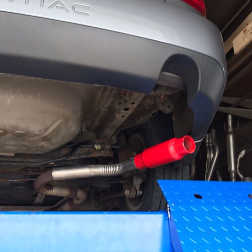 Quality Muffler Shop - Installing the muffler before lining it up. - Auto Parts & Supplies Near Me - Canton, Ohio Quality Muffler Shop - Installing the muffler before lining it up. - Auto Parts & Supplies Near Me - Canton, Ohio