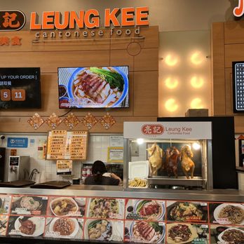 Leung Kee - a restaurant counter with menus - Cantonese Near Me - Richmond, British Columbia