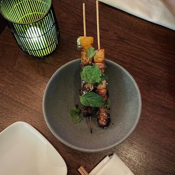 Uchiko Austin - pork belly pineapple skewers - Sushi Bars Near Me - Austin, Texas Uchiko Austin - pork belly pineapple skewers - Sushi Bars Near Me - Austin, Texas