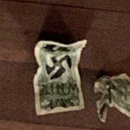Please notice that Serventes has allowed American Currency with a SWASTIKA drawn on, to be tacked to its ceiling.