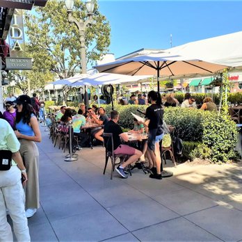 Bacari GDL - Crowds laughing and loving the day. Outdoor seating for Bacari GDL and the eponymous Frida next door. (Review upcoming) - Mediterranean Near Me - Glendale, California Bacari GDL - Crowds laughing and loving the day. Outdoor seating for Bacari GDL and the eponymous Frida next door. (Review upcoming) - Mediterranean Near Me - Glendale, California