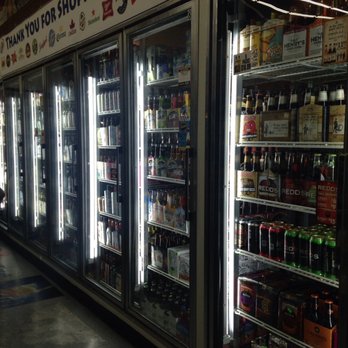 Tuscan Liquor - a row of coolers in a grocery store - Beer, Wine & Spirits Near Me - Grand Rapids, Michigan Tuscan Liquor - a row of coolers in a grocery store - Beer, Wine & Spirits Near Me - Grand Rapids, Michigan