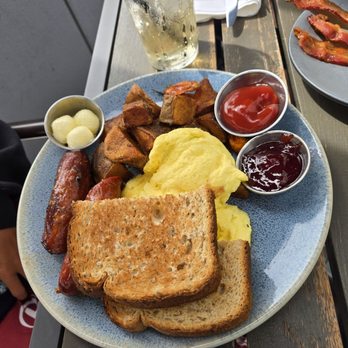Pacific Hideaway - Rise and Shine breakfast with scrambled eggs and sausage - New American Near Me - Huntington Beach, California Pacific Hideaway - Rise and Shine breakfast with scrambled eggs and sausage - New American Near Me - Huntington Beach, California