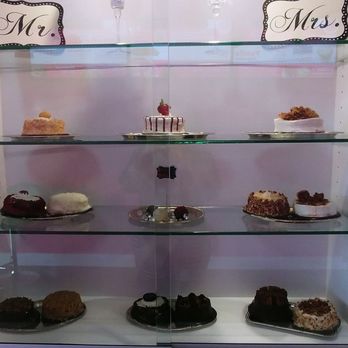 Sweet Timez Bakery - Cute little cakes on display. They make larger cakes for weddings, birthdays and special occasions!! - Bakeries Near Me - Houston, Texas Sweet Timez Bakery - Cute little cakes on display. They make larger cakes for weddings, birthdays and special occasions!! - Bakeries Near Me - Houston, Texas