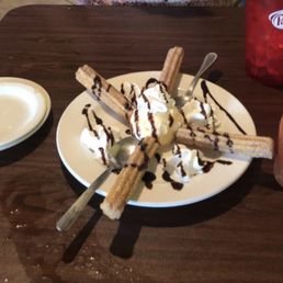 a plate of ice cream sundaes a plate of ice cream sundaes