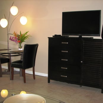 Waikiki Ocean View Condos - 40" flat panel television and glass dining table for two. - Condominiums Near Me - Honolulu, Hawaii Waikiki Ocean View Condos - 40" flat panel television and glass dining table for two. - Condominiums Near Me - Honolulu, Hawaii