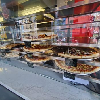 Uni Pizzeria And Grill - Display case (pizza by the slice) - Pizza Near Me - San Francisco, California Uni Pizzeria And Grill - Display case (pizza by the slice) - Pizza Near Me - San Francisco, California