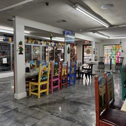 Dos Compadres - Partial view of the festive dining area (coolers in background contained beverages like Mexican beer, soda pop, etc.)
