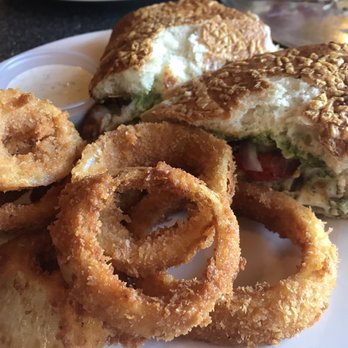 Smoking Monkey Pizza - The extremely delicious chicken pesto sandwich, and the best onion rings you'll ever eat.. - Pizza Near Me - Renton, Washington