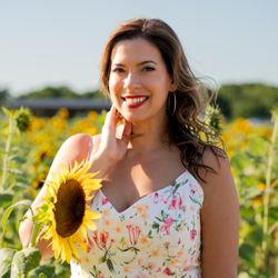 Nakita the Photographer - Candid solo portrait during a sunflower-themed party in South Florida.