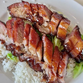 Sandy's Cafe - Char siu on rice. Because there's never enough pork goodness when it's made w the belly. And there's some nominal greens added. - Cantonese Near Me - Honolulu, Hawaii
