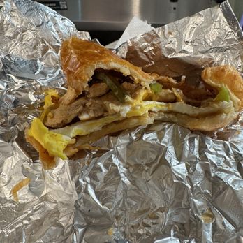 L&L Donuts - Chicken croissant sandwich (halfway eaten/ sorry) - Donuts Near Me - Round Rock, Texas L&L Donuts - Chicken croissant sandwich (halfway eaten/ sorry) - Donuts Near Me - Round Rock, Texas