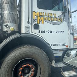 Mullen's Markings - The truck where the employee was hanging out of it and yelling at me for apparently being in the wrong place when no cones were set up.