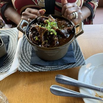 An Artistic Taste - Pot of oxtails - Salad Near Me - Newburgh, New York