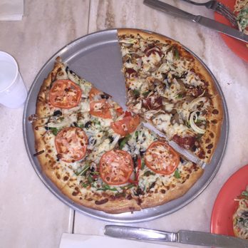 Amina Pizzeria - Don't mind the missing slice... I couldn't resist! - Pizza Near Me - Honolulu, Hawaii