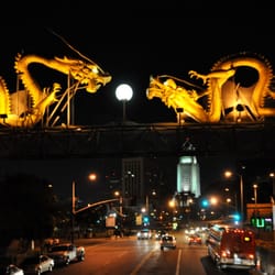 Neon Cruise Bus Tour - Dragons guarding one of the entrances to China Town.