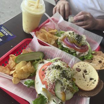 Outrageous Bagel Company - Open-Faced Turkey Sandwich, but that is my coconut pineapple smoothie boba to the left. Always on point. Consistently good! - Bagels Near Me - Miami, Florida Outrageous Bagel Company - Open-Faced Turkey Sandwich, but that is my coconut pineapple smoothie boba to the left. Always on point. Consistently good! - Bagels Near Me - Miami, Florida