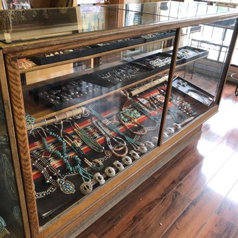 Hunt's Trading Post - a display case filled with jewelry - Coffee & Tea Near Me - Blanding, Utah Hunt's Trading Post - a display case filled with jewelry - Coffee & Tea Near Me - Blanding, Utah