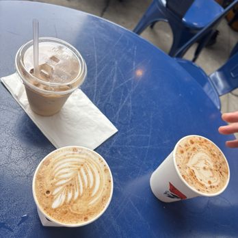 Achilles Coffee Roasters - Iced flat white, hot vanilla cinnamon latte and hot chai latte. - Coffee & Tea Near Me - San Diego, California Achilles Coffee Roasters - Iced flat white, hot vanilla cinnamon latte and hot chai latte. - Coffee & Tea Near Me - San Diego, California