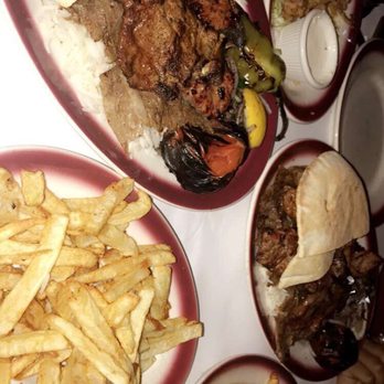 Taci's Beyti - Side fries and rice over Mixed grill - Turkish Near Me - Brooklyn, New York Taci's Beyti - Side fries and rice over Mixed grill - Turkish Near Me - Brooklyn, New York