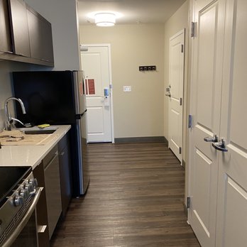 Townplace Suites By Marriott - Kitchen in 1 bedroom suite - Hotels Near Me - Janesville, Wisconsin