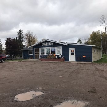 Ino Bar - a blue building with a red truck parked in front of it - Dive Bars Near Me - Mason, Wisconsin Ino Bar - a blue building with a red truck parked in front of it - Dive Bars Near Me - Mason, Wisconsin