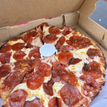 Dollies Pub & Cafe - Medium pepperoni extra sauce cooked well done - Pizza Near Me - Lahaina, Hawaii Dollies Pub & Cafe - Medium pepperoni extra sauce cooked well done - Pizza Near Me - Lahaina, Hawaii