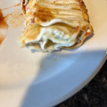 Shots On The River - Freezer Burnt Lasagne Roll that was plated and served to me - Sports Bars Near Me - Belmont, Michigan Shots On The River - Freezer Burnt Lasagne Roll that was plated and served to me - Sports Bars Near Me - Belmont, Michigan