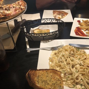 Mamma's Kitchen - A small meat lovers pizza with a side of garlic bread and French fries, along with, fettuccine Alfredo topped with chicken. - Italian Near Me - Alexandria, Virginia Mamma's Kitchen - A small meat lovers pizza with a side of garlic bread and French fries, along with, fettuccine Alfredo topped with chicken. - Italian Near Me - Alexandria, Virginia