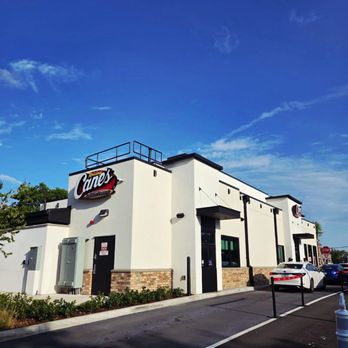 Raising Cane's Chicken Fingers - Drive-thru has 2 lanes side by side. - Fast Food Near Me - Tamarac, Florida Raising Cane's Chicken Fingers - Drive-thru has 2 lanes side by side. - Fast Food Near Me - Tamarac, Florida