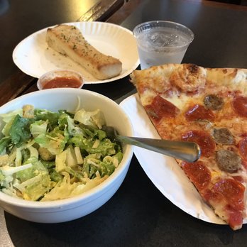 Ian’s Pizza Madison | State Street - Pepperoni and sausage slice with breadsticks and side Caesar salad. - Pizza Near Me - Madison, Wisconsin