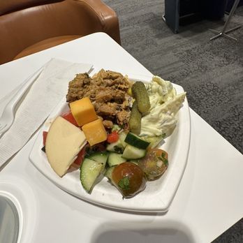 Delta Sky Club - Got all the salads and some meats cheeses and tagine chicken - Airport Lounges Near Me - Miami, Florida