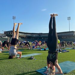 Baptiste Power Yoga Fort Wayne - FILL THE FEILD at Parkview field! Happens once a year in the summer!!