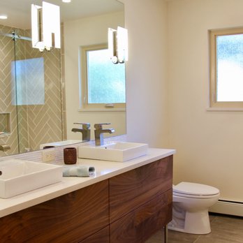 The Home Masters - a bathroom with a sink and a toilet - General Contractors Near Me - Colorado Springs, Colorado The Home Masters - a bathroom with a sink and a toilet - General Contractors Near Me - Colorado Springs, Colorado