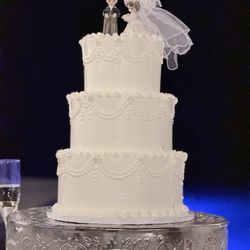 Maggie's Bakery - Maggie's did an outstanding job on our cake! Not only was it beautiful with my husbands mothers & fathers cake topper from 1963.