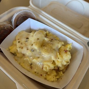 Brewed Awakenings Coffee - Scrambled eggs with cheese over tots - Coffee & Tea Near Me - Williams, Arizona Brewed Awakenings Coffee - Scrambled eggs with cheese over tots - Coffee & Tea Near Me - Williams, Arizona