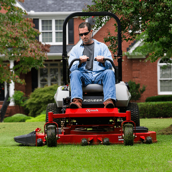 365 Landscapes - a man sitting on a riding lawn mower - Landscaping Near Me 365 Landscapes - a man sitting on a riding lawn mower - Landscaping Near Me