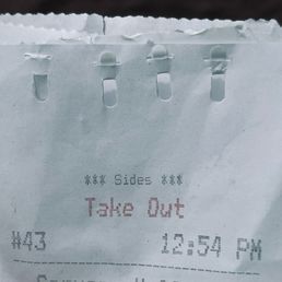 Spuds Fish & Chips clips their receipt to the bag without staples. It instead perforates both leaf and folds them under each other.