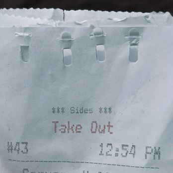 Spud Fish & Chips - Spuds Fish & Chips clips their receipt to the bag without staples. It instead perforates both leaf and folds them under each other. - Fish & Chips Near Me - Kirkland, Washington