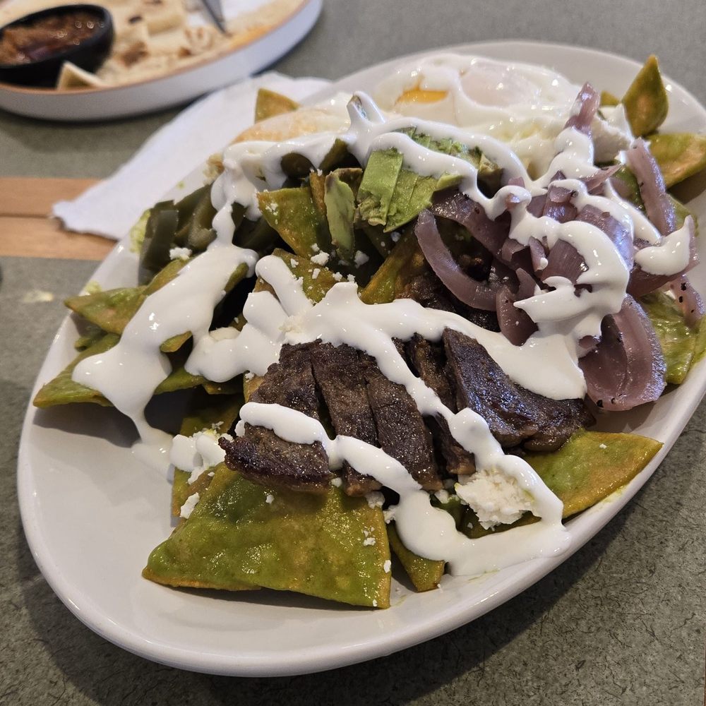 Evergreen Breakfast - Chil-a-killers: over easy with green salsa - Breakfast & Brunch Near Me - San Jose, California Evergreen Breakfast - Chil-a-killers: over easy with green salsa - Breakfast & Brunch Near Me - San Jose, California