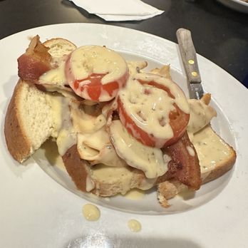 Big Es Bar And Grill - Turkey Devonshire-shaved cold lunch meat, 1 strip of bacon, untoasted white bread, overly ripe tomato, and a bit of cold cheese sauce. $21 - American Near Me - Sutersville, Pennsylvania Big Es Bar And Grill - Turkey Devonshire-shaved cold lunch meat, 1 strip of bacon, untoasted white bread, overly ripe tomato, and a bit of cold cheese sauce. $21 - American Near Me - Sutersville, Pennsylvania