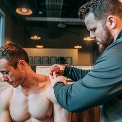 Columbus Pain & Performance - Dr. Kelly w/ an athlete.