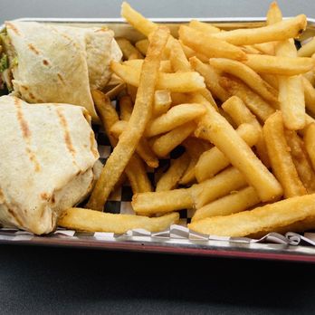 Breeze Bar and Grill - Buffalo Chicken Wrap - New American Near Me - Orlando, Florida Breeze Bar and Grill - Buffalo Chicken Wrap - New American Near Me - Orlando, Florida