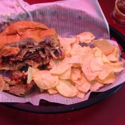Erickson's Smokehouse Bar & Grill - Pull pork sandwich and chips. The cole slaw makes it extra special. This dedicated to Faye, my vegetarian friend.