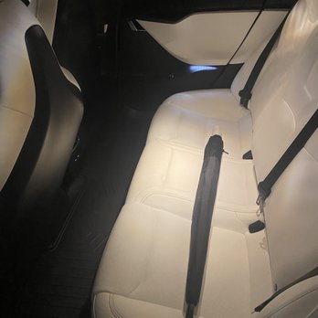 Precision Power Wash & Detail - The back row or seat of the Tesla after the detail. - Auto Detailing Near Me Precision Power Wash & Detail - The back row or seat of the Tesla after the detail. - Auto Detailing Near Me
