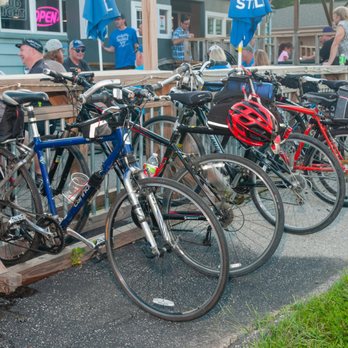 Triangle Tap - a row of bicycles parked in front of a restaurant - Dive Bars Near Me - Des Moines, Iowa