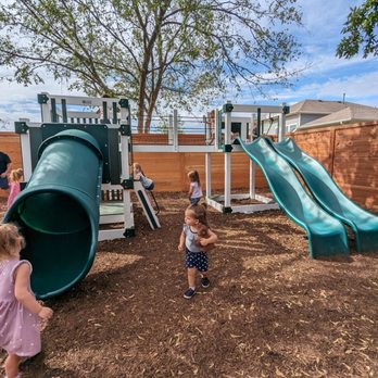 Progress Coffee + Beer - children playing in the backyard - Coffee & Tea Near Me - Buda, Texas Progress Coffee + Beer - children playing in the backyard - Coffee & Tea Near Me - Buda, Texas