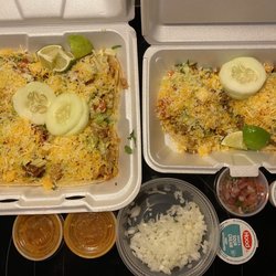 El Charro - Six tacos (chorizo, pork, beef and chicken) with all the toppings. I asked for the onions on the side.